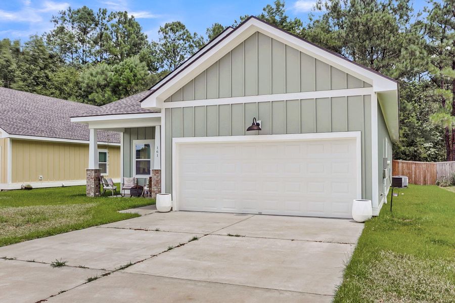 Front exterior of a new home in , Huger, SC, highlighting curb appeal (Image 2). Front exterior of a new home in , Huger, SC, highlighting curb appeal (Image 2).