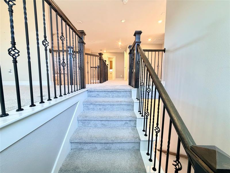 Stairway featuring recessed lighting Stairway featuring recessed lighting