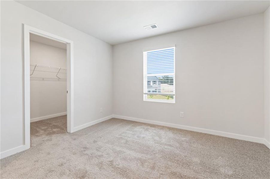 Spacious, unfurnished interior of a new home in Fern Dale, Fairburn (Image 27).