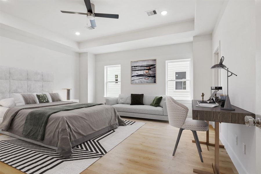 Heading up to the third floor, you'll discover the spacious primary suite. This impressive space offers ample room for all your furniture and even more!