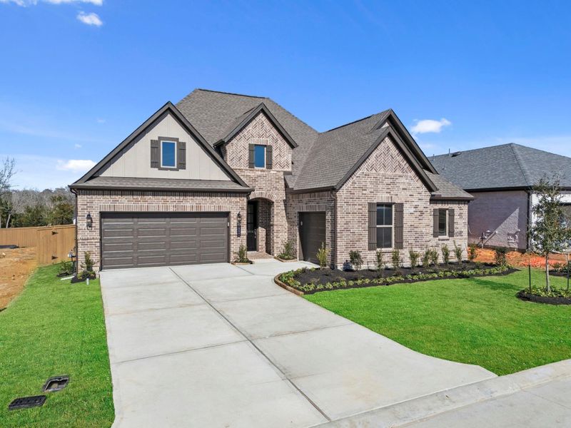 Front exterior of a new home in Chambers Creek, Willis, TX, highlighting curb appeal (Image 21).