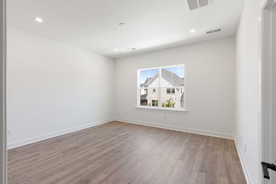 Spacious, unfurnished interior of a new home in Hayes Park, Johns Island (Image 22).