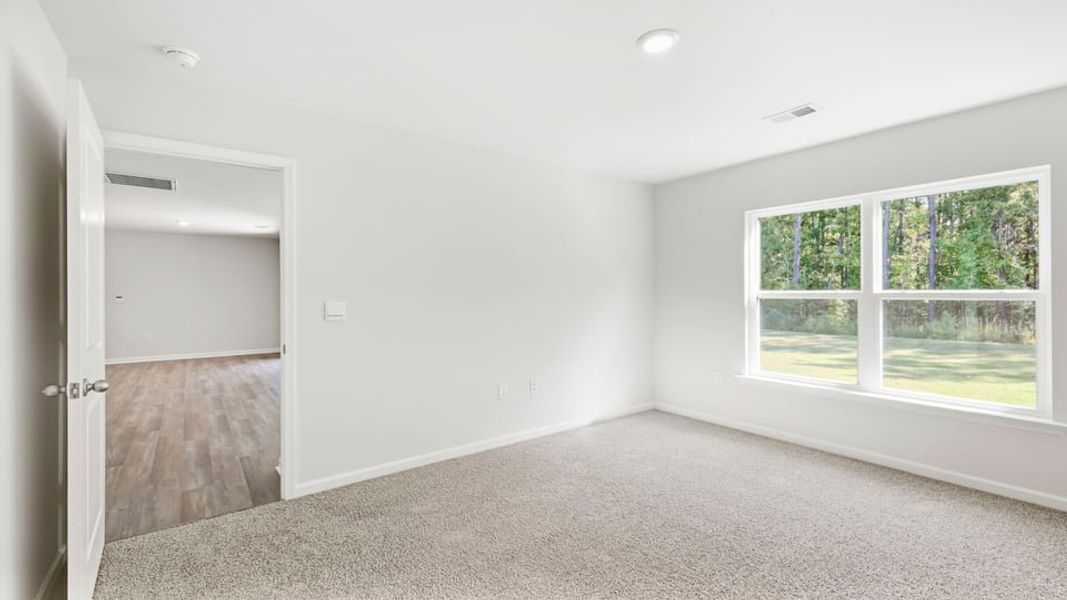 Spacious, unfurnished interior of a new home in Ravencrest, Roebuck (Image 33).