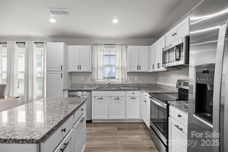 Furnished interior view inside a new home in , Charlotte (Image 15).