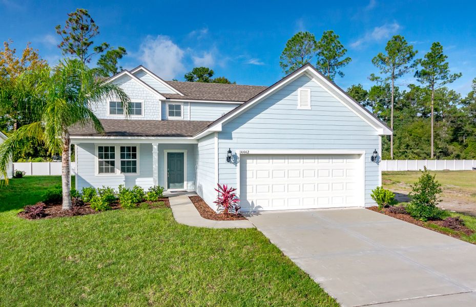 Front exterior of a new home in Waterways, Richmond Hill, GA, highlighting curb appeal (Image 21).