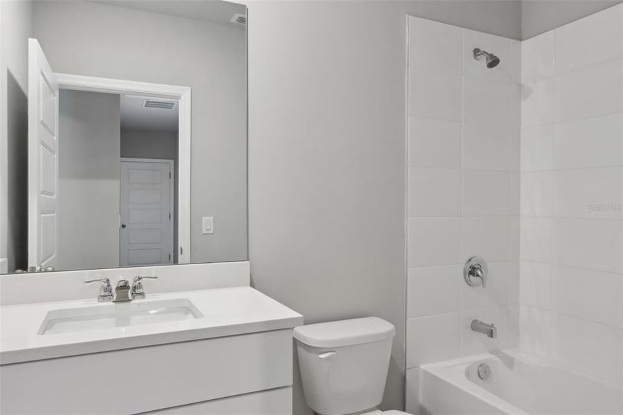 Furnished interior view inside a new home in Crescent Lakes - Premier Series, Punta Gorda (Image 5). Furnished interior view inside a new home in Crescent Lakes - Premier Series, Punta Gorda (Image 5).