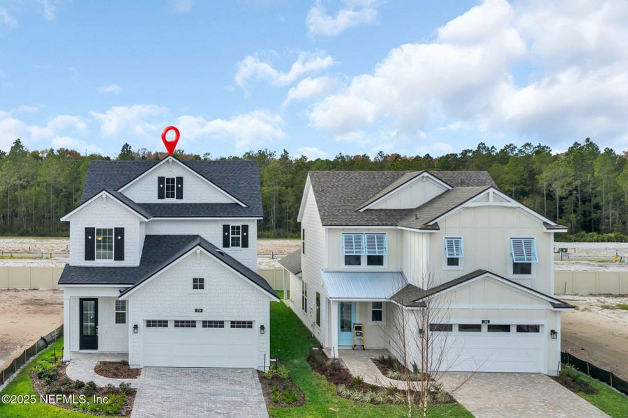 Front exterior of a new home in Seabrook Village at Seabrook, Ponte Vedra, FL, highlighting curb appeal (Image 25).