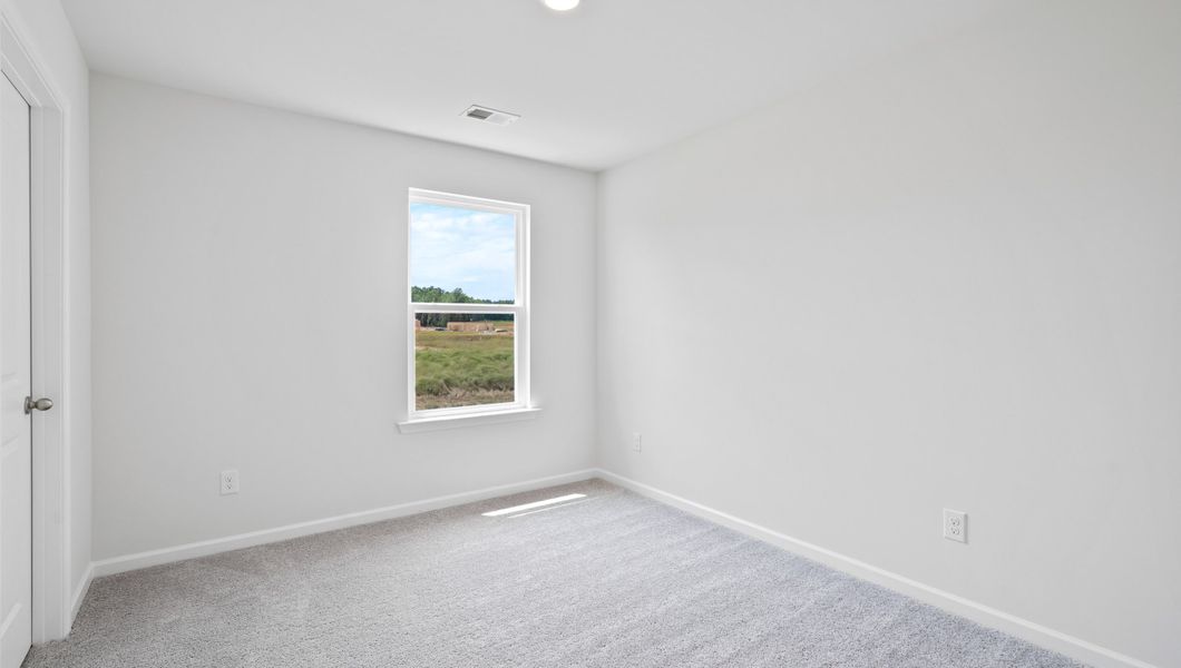 Representative unfurnished interior of a home built from the AISLE by D.R. Horton in Harrier Point, Woodruff (Image 16).