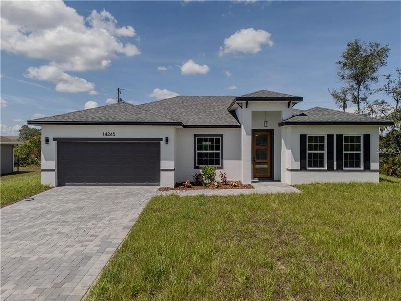 Front exterior of a new home in , Ocala, FL, highlighting curb appeal (Image 31). Front exterior of a new home in , Ocala, FL, highlighting curb appeal (Image 31).