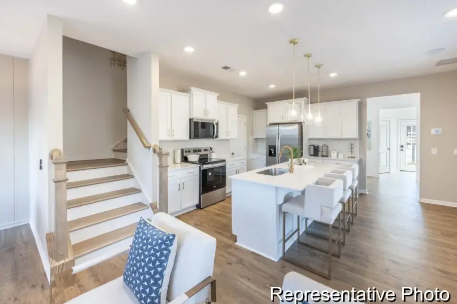 Furnished interior view inside a new home in Village Heights TH, Greensboro (Image 8).