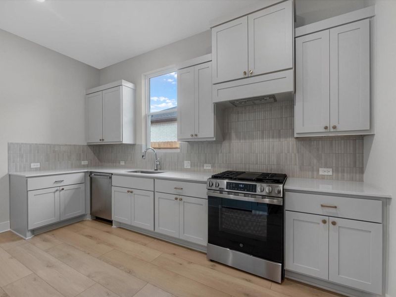 Furnished interior view inside a new home in Harvest Green, Richmond (Image 7).