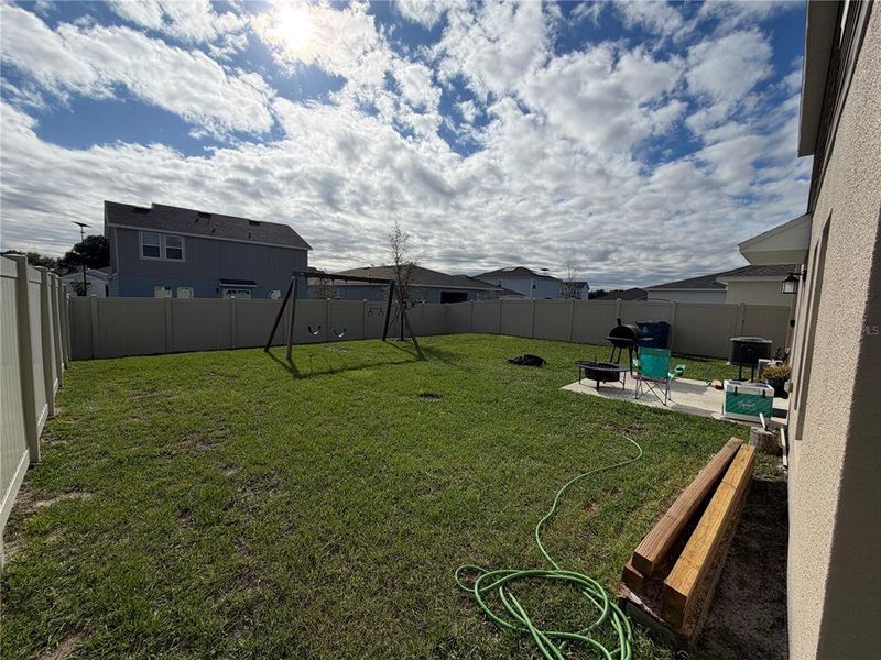 Exterior details and patio area of a home in Ranches at Lake McLeod, Eagle Lake (Image 9).