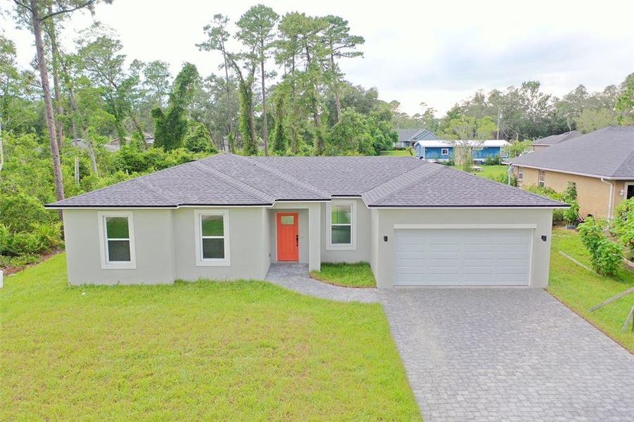 Front exterior of a new home in , Deland, FL, highlighting curb appeal (Image 18).