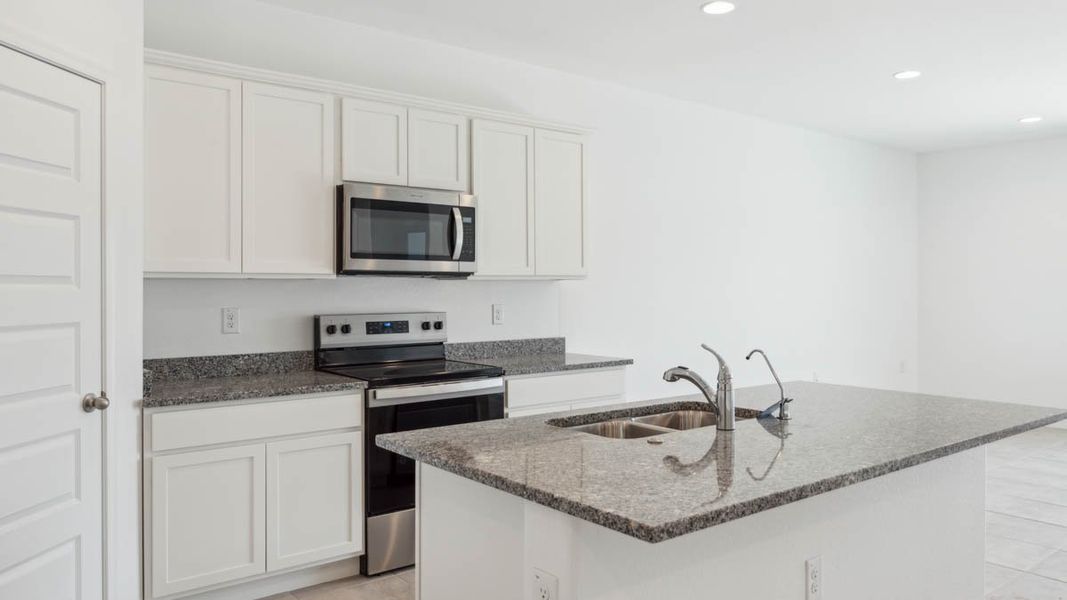 Representative furnished interior of a home built from the Mitchell by D.R. Horton in Upper Canyon, Phoenix (Image 6).