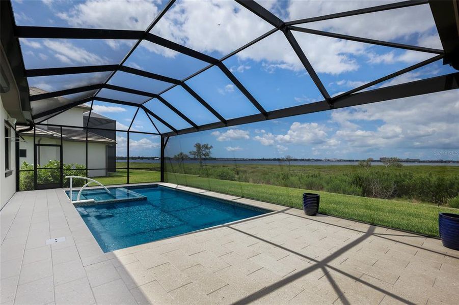 Exterior details and patio area of a home in , Palmetto (Image 24).