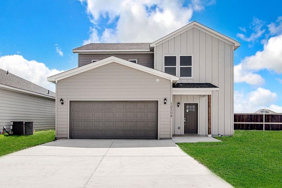 Front exterior of a new home in Trails of Fossil Creek, Fort Worth, TX, highlighting curb appeal (Image 1). Front exterior of a new home in Trails of Fossil Creek, Fort Worth, TX, highlighting curb appeal (Image 1).