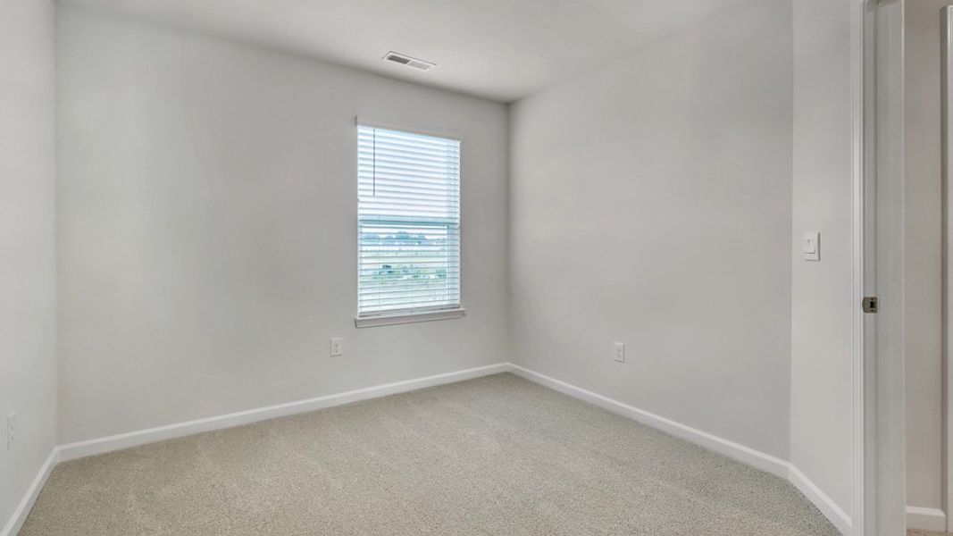 Spacious, unfurnished interior of a new home in The Townes at Honeycutt Oaks, Angier (Image 22).