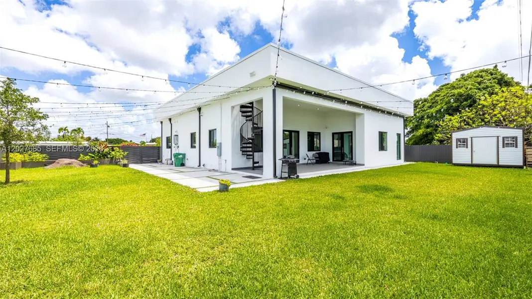 Exterior details and patio area of a home in , Miami (Image 3).