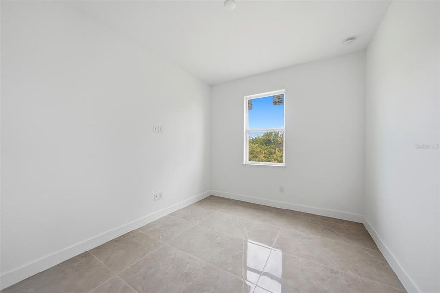 Spacious, unfurnished interior of a new home in , Port Charlotte (Image 38).