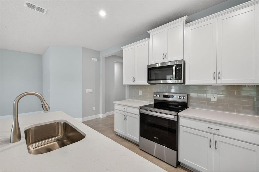 Furnished interior view inside a new home in Windwater, Parrish (Image 10).