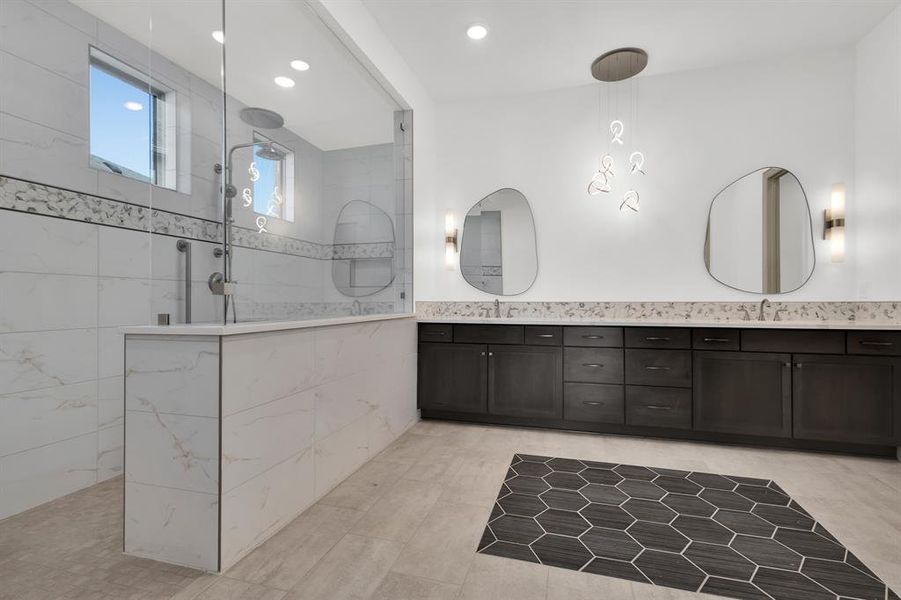 Full bath with walk in shower and double vanity