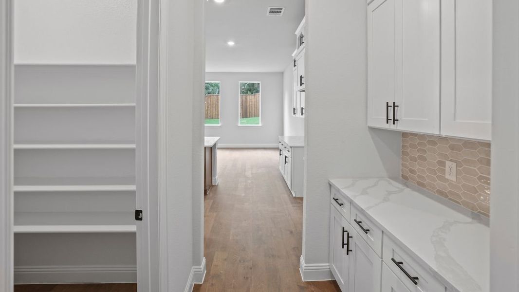 Representative furnished interior of a home built from the Hemingway by D.R. Horton in Northside Place, Carrollton (Image 7). Representative furnished interior of a home built from the Hemingway by D.R. Horton in Northside Place, Carrollton (Image 7).