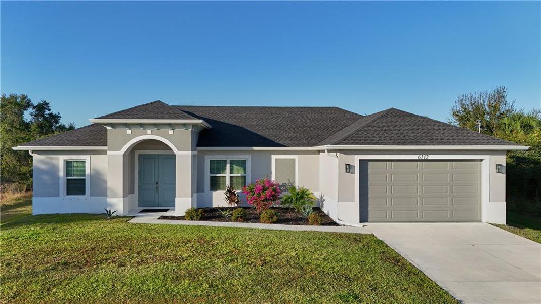 Front exterior of a new home in , North Port, FL, highlighting curb appeal (Image 28).