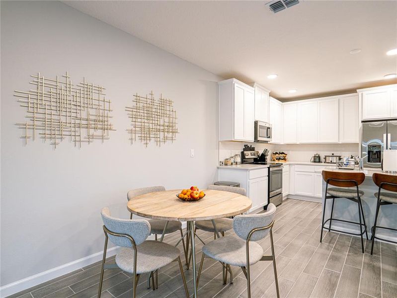 Furnished interior view inside a new home in Towns at Tuskawilla Commons, Oviedo (Image 13).