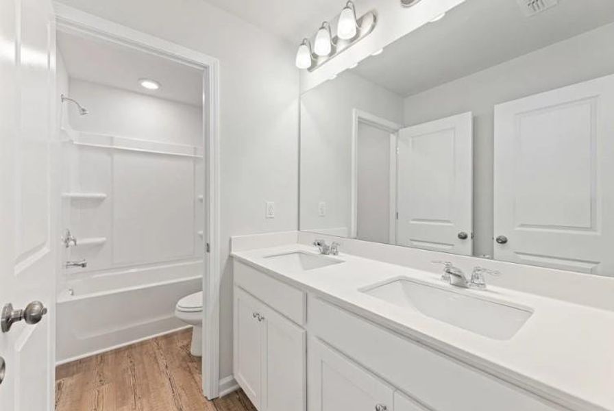 Furnished interior view inside a new home in Kingsley Creek, Lithonia (Image 3). Furnished interior view inside a new home in Kingsley Creek, Lithonia (Image 3).