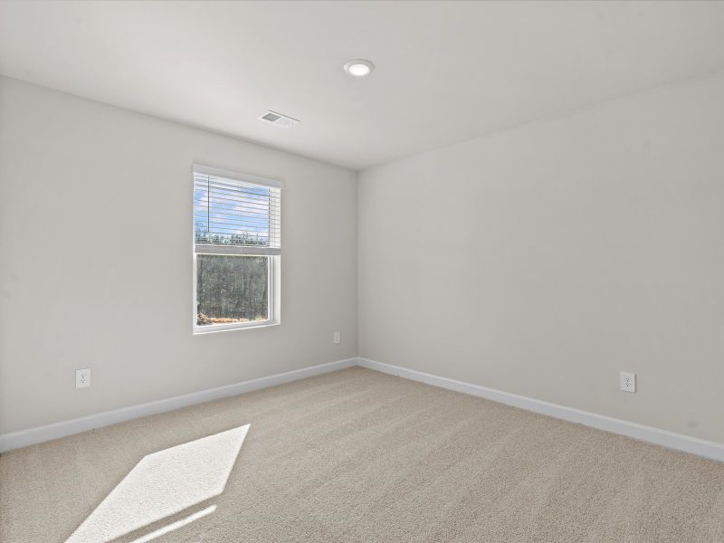 Spacious, unfurnished interior of a new home in The Farm at Wells Creek - Signature Collection, Gray Court (Image 18).