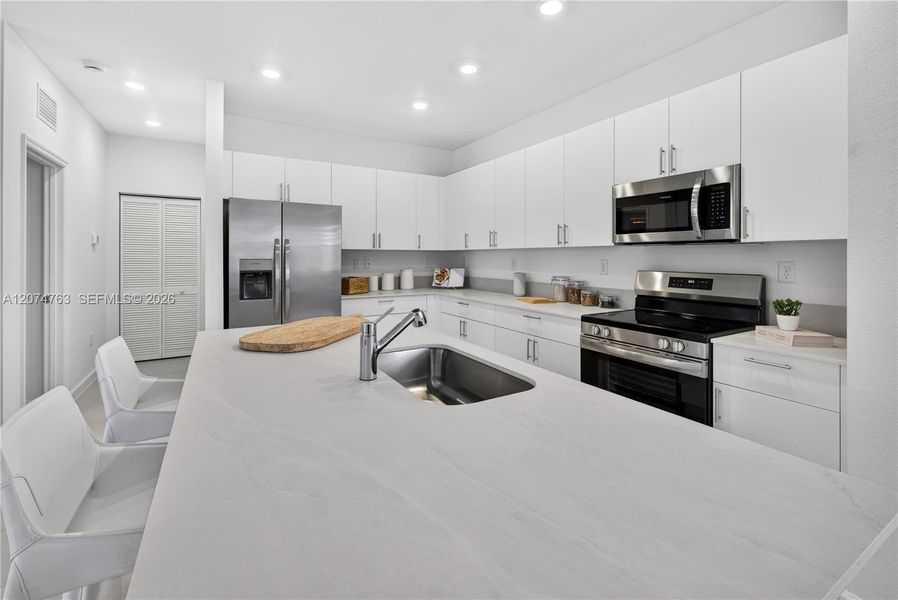 Furnished interior view inside a new home in Acacia Groves, Miami (Image 5).