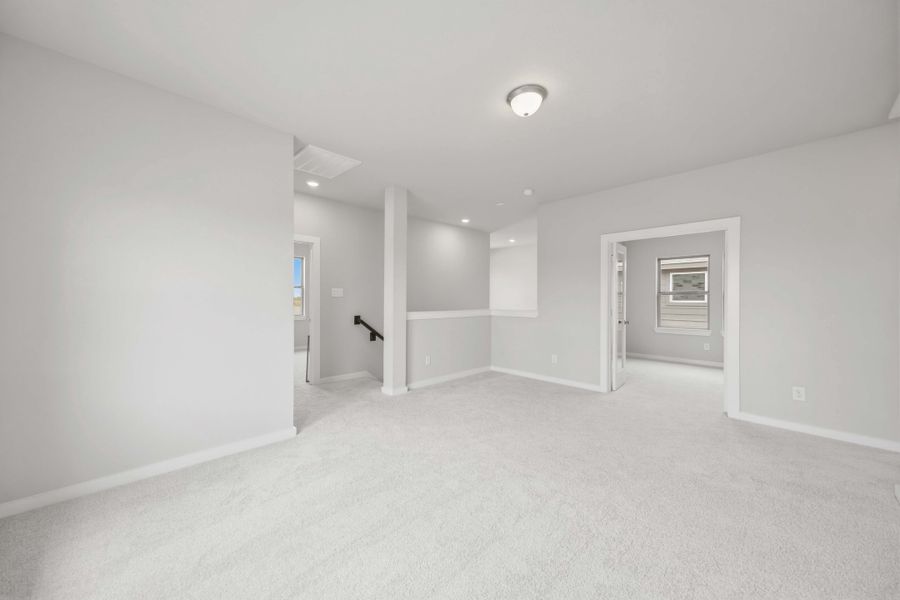 Spacious, unfurnished interior of a new home in Sunterra 40, Katy (Image 29).