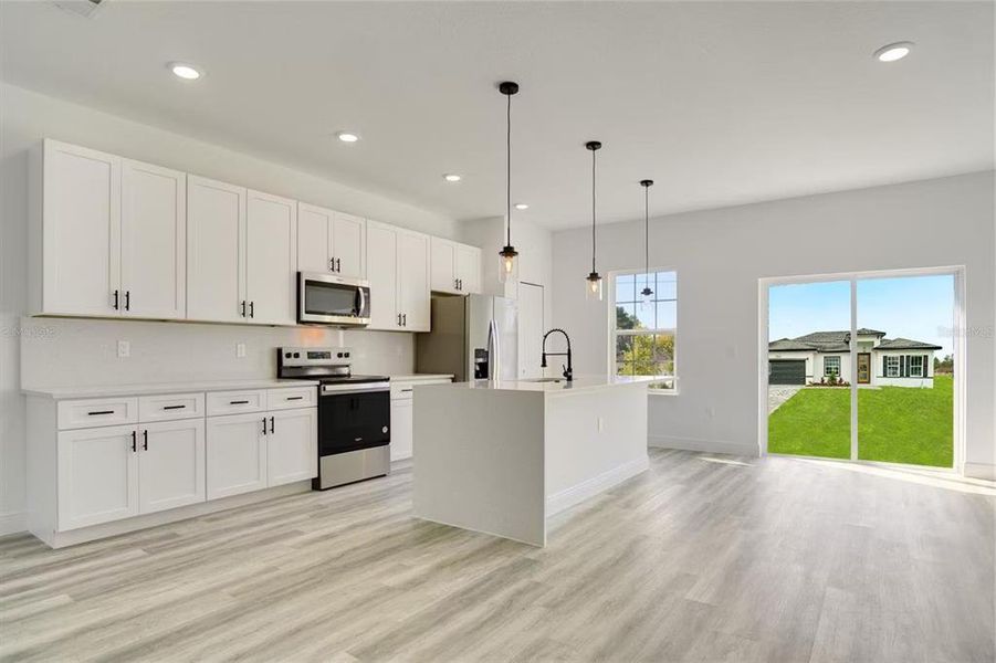 Furnished interior view inside a new home in , Dunnellon (Image 11).