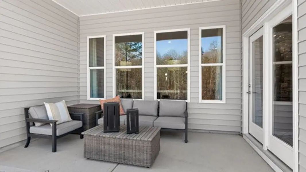 Exterior details and patio area of a home in The Villas at Galvins Ridge, Sanford (Image 3). Exterior details and patio area of a home in The Villas at Galvins Ridge, Sanford (Image 3).