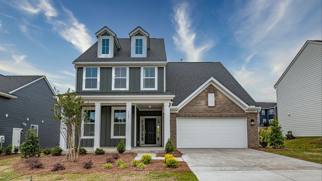 Representative exterior photo of a completed home built from the Drayton by DRB Homes in Farms at Bellingham, Mooresville, NC (Image 18). Representative exterior photo of a completed home built from the Drayton by DRB Homes in Farms at Bellingham, Mooresville, NC (Image 18).