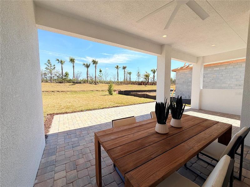 Exterior details and patio area of a home in Valencia Ridge, Wesley Chapel (Image 22).