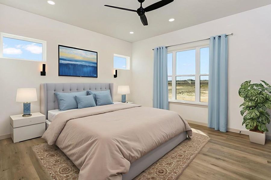 Bedroom featuring light wood finished floors, a ceiling fan, and recessed lighting Bedroom featuring light wood finished floors, a ceiling fan, and recessed lighting