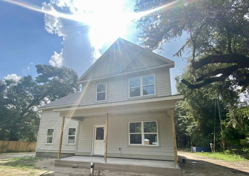 Front exterior of a new home in , Johns Island, SC, highlighting curb appeal (Image 2).