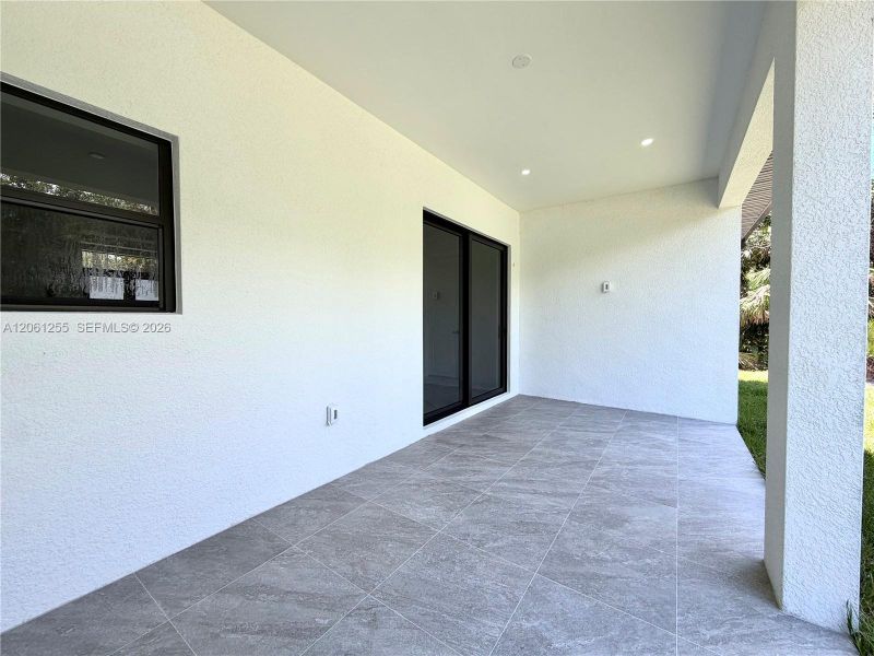 Exterior details and patio area of a home in , Naples (Image 21). Exterior details and patio area of a home in , Naples (Image 21).