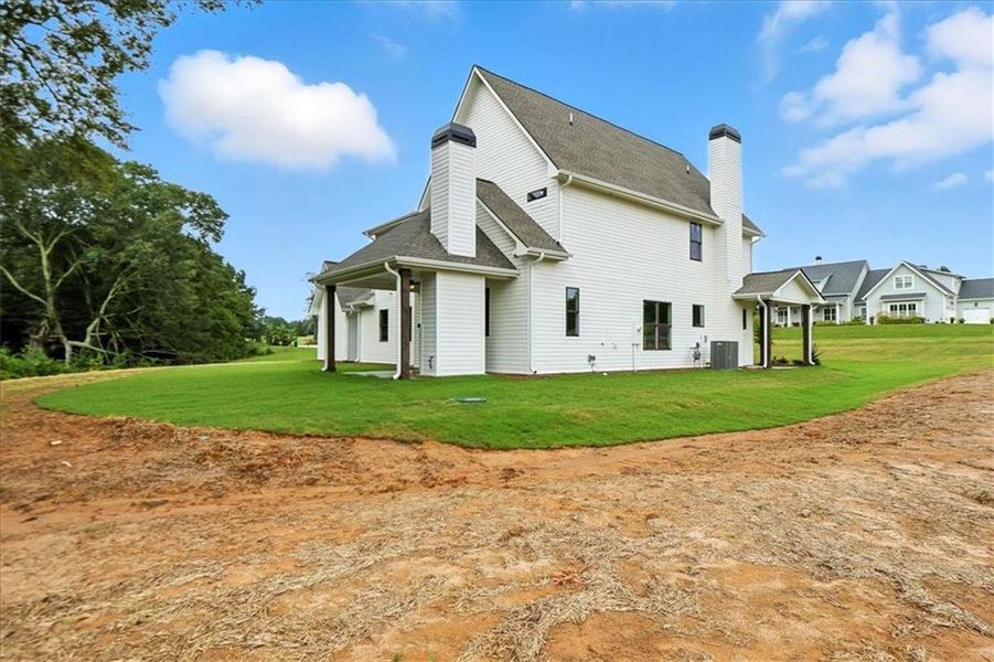 Exterior details and patio area of a home in Old Town Estates, Dacula (Image 31).
