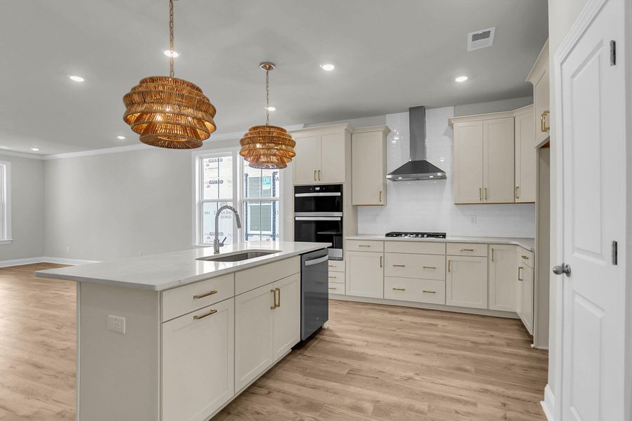 Furnished interior view inside a new home in Tidewater at Lakes of Cane Bay, Summerville (Image 6).