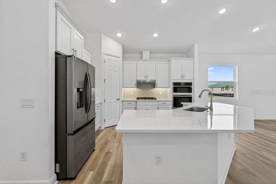 Furnished interior view inside a new home in Lakes of Mount Dora, Mount Dora (Image 5).