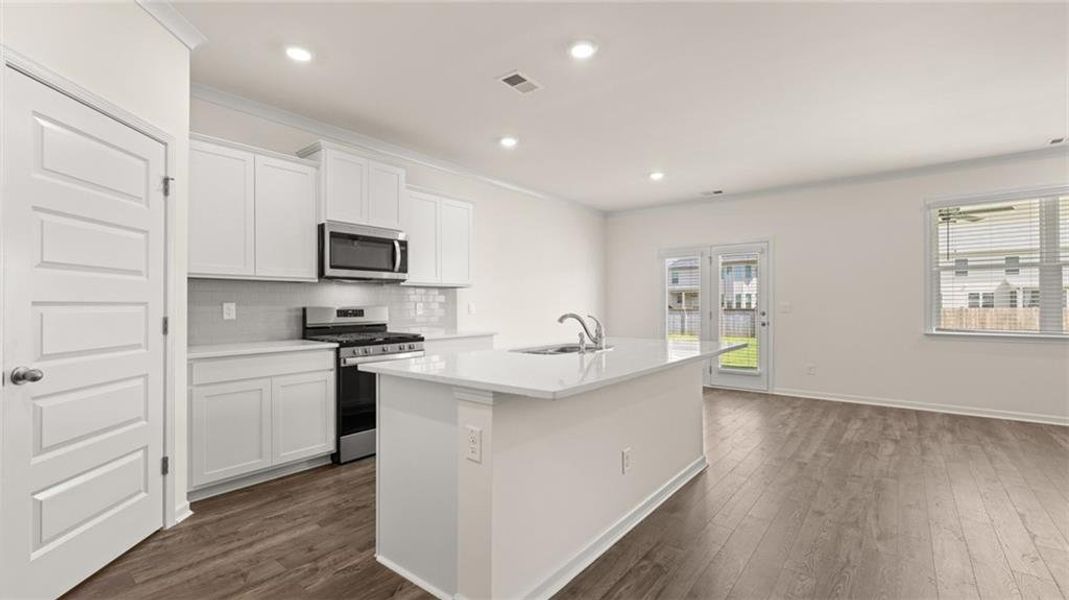 Furnished interior view inside a new home in The Preserve at Agricultural Village, Perry (Image 9).