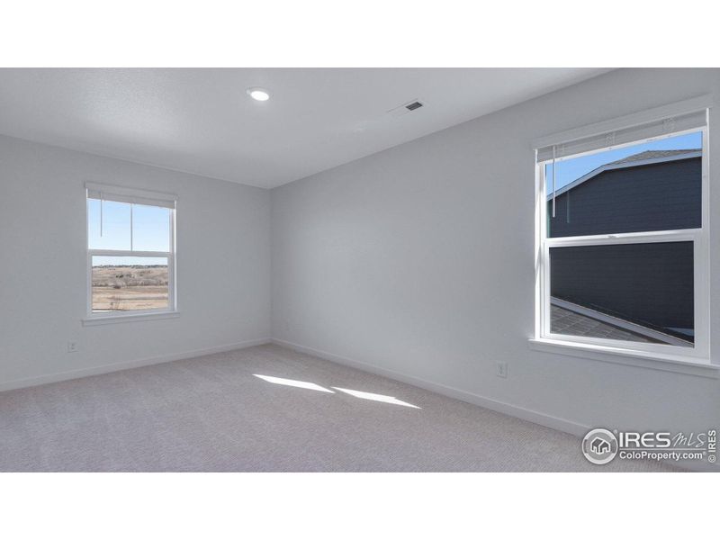 Spacious, unfurnished interior of a new home in Vista Meadows, Fort Lupton (Image 23).
