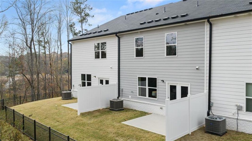 Exterior details and patio area of a home in Echo Glen, Stockbridge (Image 27).