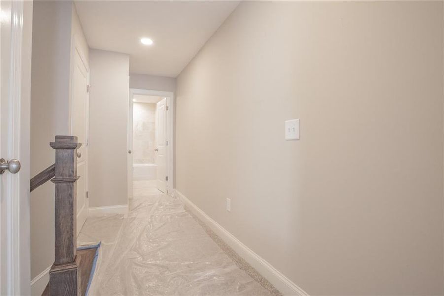 Spacious, unfurnished interior of a new home in The Birches on Maple, Carrollton (Image 16).