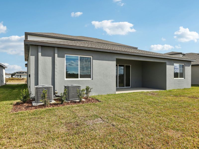 Exterior details and patio area of a home in Two Rivers - Signature Series, Zephyrhills (Image 4).