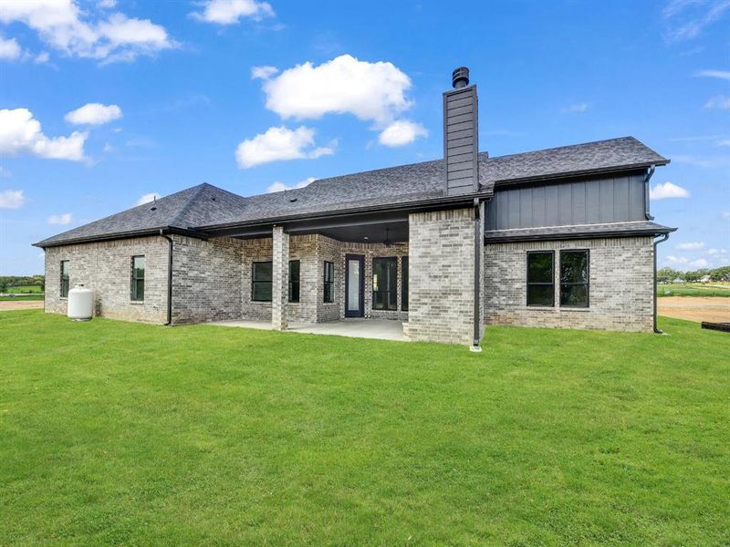Front exterior of a new home in , Weatherford, TX, highlighting curb appeal (Image 20).
