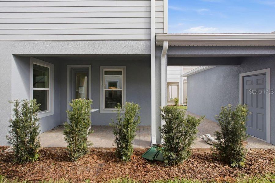 Exterior details and patio area of a home in Center Lake Ranch Community Group Page, St. Cloud (Image 3).