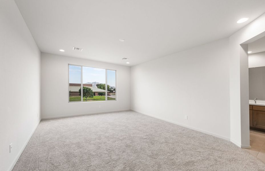 Spacious, unfurnished interior of a new home in Legado West, Queen Creek (Image 21).